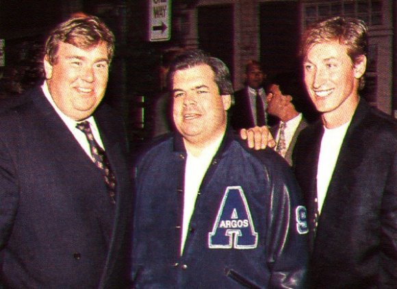 John Candy, Bruce McNall and Wayne Gretzky in happier days at the Toronto Argonauts.