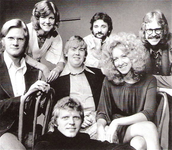 Some members of Second City, (clockwise from bottom): David Rasche, Jim Staahl, Ann Ryerson, John Candy, Bill Murray, Betty Thomas and Tino Insana.