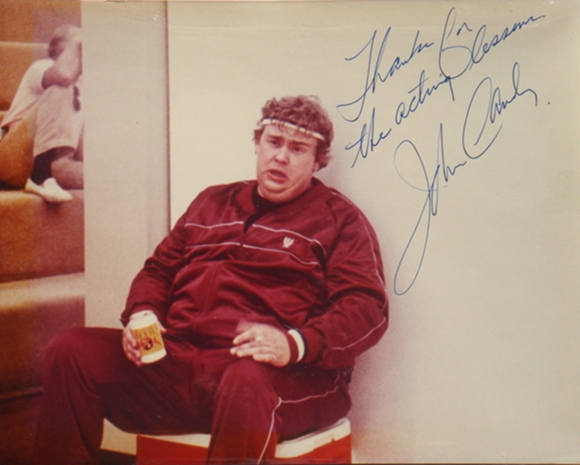 John Candy with beer and cigarette in hand after workout 